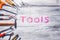 Industry toolkit and written tools close up