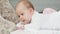 Infancy, childhood, development, summer holiday, medicine and health concept - Close-up portrait of awake newborn baby