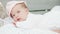 Infancy, childhood, development, summer holiday, medicine and health concept - Close-up portrait of awake newborn baby