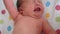 Infancy, childhood, medicine and health, pediatrics concept - close-up of newborn baby in first minutes of life