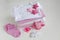 infant baby clothes baby girl pacifier cap on background