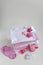 infant baby clothes baby girl pacifier cap on background