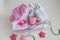 infant baby clothes baby girl pacifier cap on background