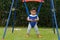 infant baby jumping in jumper swing