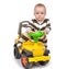 Infant child baby boy toddler happy driving big toy car truck