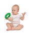 Infant child baby boy toddler playing holding green circle