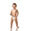 Infant child baby girl kid toddler in diaper make first steps with mobile cellphone isolated on a white