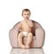 Infant child baby girl kid toddler in diaper sit in little armchair chair