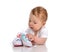 Infant child baby girl lying happy searching new shoes