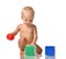 Infant child baby toddler sitting in diaper with green blue brick toy and red ball playing