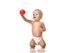 Infant child baby toddler sitting in diaper and play with red ball isolated