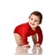 Infant child boy toddler in red body cloth learning crawling happy smiling