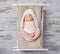 Infant girl asleep on a small crib