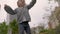 Infant girl jumping on trampoline