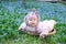 Infant girl snowdrops field