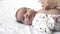 Infant, motherhood, development, childhood, training, pediatrics, medicine and health concept - close-up newborn