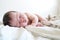 Infant newborn baby portrait close up first day life sleeping