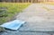 An infected used medical mask lies on the footpath