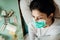 Infected woman with mask in mobile quarantine hospital units isolation.Coronavirus patient having pneumonia disease symptoms.