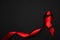 Infection symbol. Red ribbon symbol in hiv world day on dark background. Awareness aids and cancer. Healthcare and medical concept