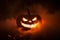 Infernal Glow Scary Halloween Jack O Lantern Face Glowing in Smoke and Fire. created with Generative AI