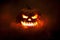 Infernal Glow Scary Halloween Jack O Lantern Face Glowing in Smoke and Fire. created with Generative AI