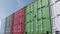 Infinite dolly shot of colored cargo containers against blue sky, shallow focus. 4K seamless loopable clip, ProRes