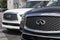 Infiniti QX80 display at a dealership. Infiniti offers the QX80 in Luxe, Premium and Sensory models