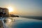 Infinity pool with crystal blue water view to sea  ocean