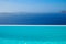 Infinity pool Santorini Greece looking out over the caldera of the Greek Island, luxury vacation, swimming pool
