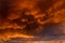 Inflamed sky with mammatus clouds at sunset