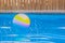 Inflatable ball floating swimming pool water surface summer time relaxation space concept picture with empty copy space for your