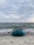 Inflatable boad on the beach on sunset