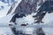 Inflatable boat full of tourists, watching for whales and seals, Antarctic Peninsula