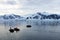 Inflatable boat full of tourists, watching for whales and seals, Antarctic Peninsula