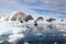 Inflatable boat full of tourists, watching for whales and seals, Antarctic Peninsula