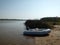 Inflatable boat on a river bank