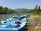 Inflatable boats with oars rafts for rafting along a mountain