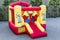 Inflatable bouncy jumper with red and yellow clown decoration