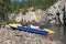 Inflatable catamarans on the bank of a mountain river.