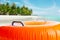 Inflatable orange cushion on the beach