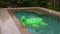 Inflatable pool toy floating in swimming pool.