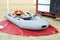 Inflatable Rescue Boat. Gray inflatable boat on the beach in the