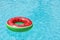 Inflatable ring floating in pool