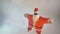 Inflatable Santa salutes and greets the camera.