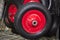 Inflatable wheels for construction wheelbarrows black red lying in a metal basket. Construction, repair