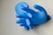 Inflated blue medical gloves
