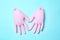 Inflated medical gloves on color background,