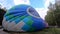 Inflating balloon lying ground. Large blue balloon inflated air Balloon Festival