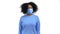 Inflexible african woman in facial protective mask disapproving with no head sign, nods head disapprovingly. Denying